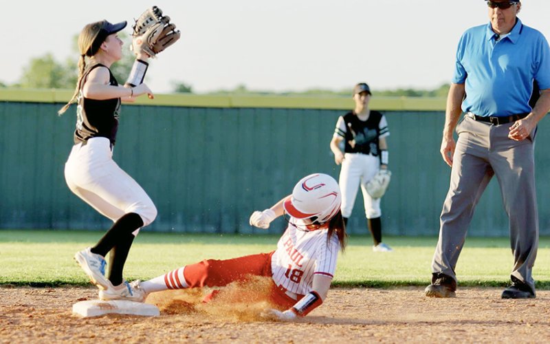 Samantha Moeller successfullly  slides into base against Austin Brentwood April 11. Photo courtesy of Louann Heinsohn