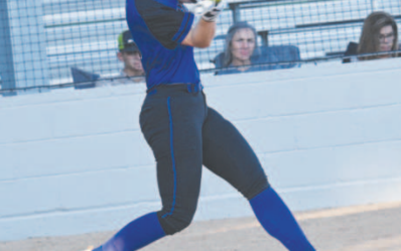 Ava Lackey gets loft on the ball in hitting a home run against the San Antonio Saints. Chuck Grafe/Tribune-Herald