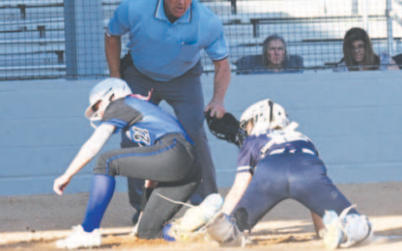 Haley Noska scores a run in the SA Saints game. Chuck Grafe/Tribune-Herald