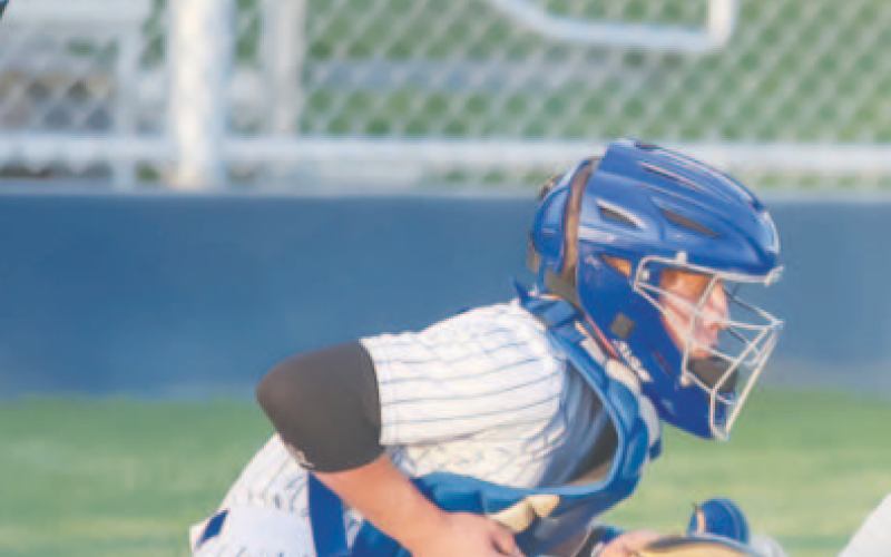 YHS Bulldog catcher Ty Gordon stops the ball against the Brahmas in Hallettsville. Photo courtesy of Raymond Rosas.