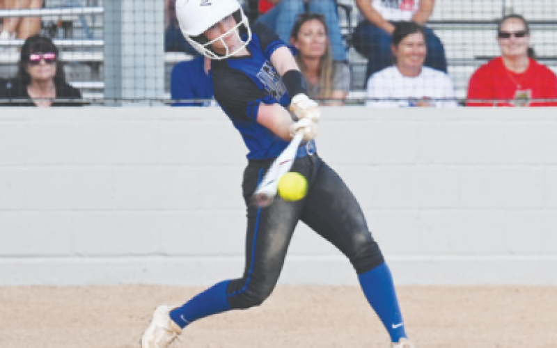 Kenzie Chance hits a RBI single during the six-run third inning. Chuck Grafe/ Tribune-Herald
