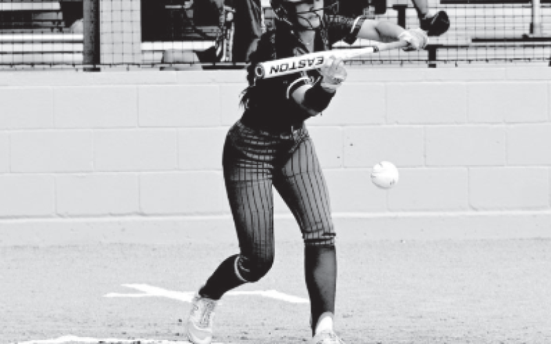 Rebecca Satsky lays down a perfect sacrifice bunt in the first inning Friday. Chuck Grafe/Tribune-Herald