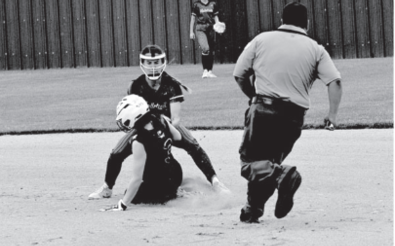 Shortstop Macey Pustka makes a put out at second base in the first inning Friday. Chuck Grafe/Tribune-Herald