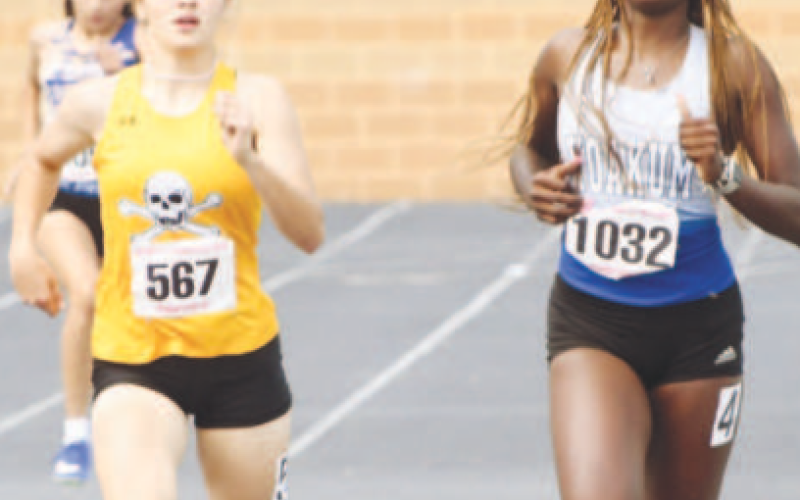 Pictured above at right is Jayana Phillips. She will compete in the 400-meter dash and the triple jump at the State Meet May 2-4 in Austin. Photo by Mark Lube.