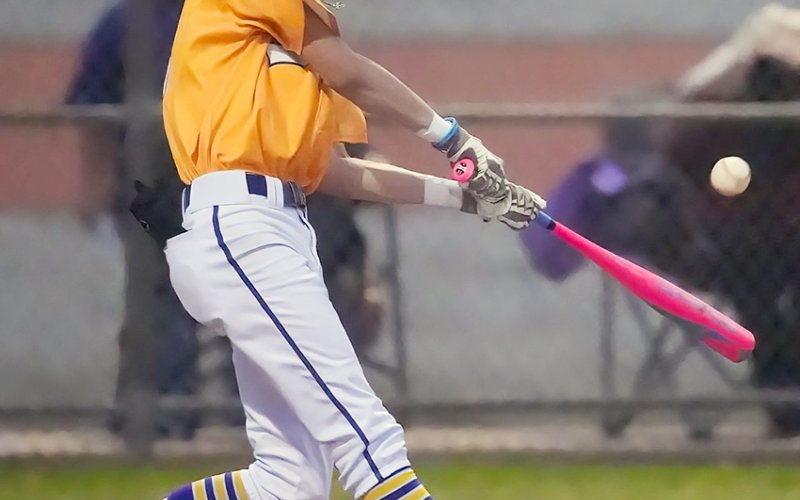 Boe Boehm drove in two runs with this hit April 8 in Schulenburg. Photo courtesy of Howard Esse.