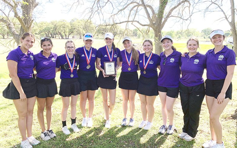 The Shiner Lady Comanches golf team are district champions and team regional qualifers. From left are Chesney Machacek, Jaeleigh Ramirez, Grace Migl, Chelsea Whiddon, Morgan Lenehan, Callie Chrismon, Brianna Sofka, Maddie Collins, Olivia Akin and Evy Johnson. Photo courtesy of Michelle Winkenwerder.