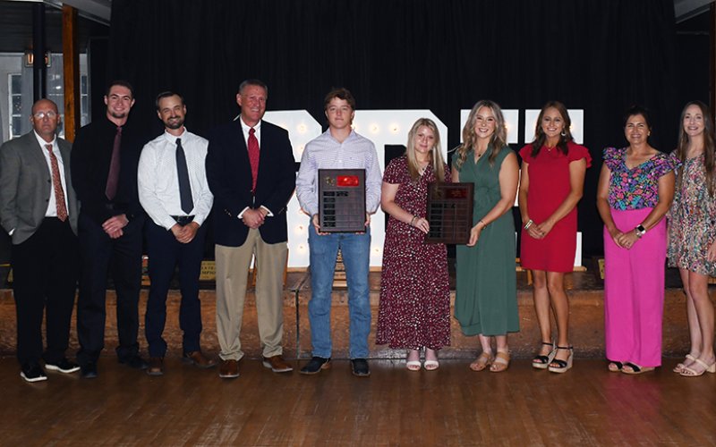 Impact Award winners are Nathan Timmons (fifth from left), Maurin Knesek (fifth from right) and Faith Machart (fourth from right). Also shown are Mike Jackson (left), Ryan Geiger (second from left),Charlie Mieschen (third from left), Jake Wachsmuth (fourth from left), Lenae Long (third from right), Nicco Brown (second from right) and Emily Mieschen (right). Photo by Mark Lube.
