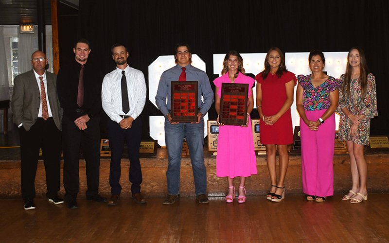 Scholarship winners: Michael Muelker Memorial Scholarship winner Nate Boedeker (fourth from right), James Muelker Memorial Scholarship winner Brooke Cerny (fourth from right). Also shown are Mike Jackson (left), Ryan Geiger (second from left), Charlie Mieschen (third from left), Lenae Long (third from right), Nicco Brown (second from left) and Emily Mieschen (left). Photo by Mark Lube.
