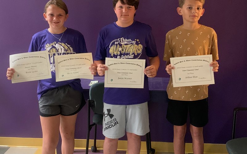 Lavaca Soil and Water Conservation District 13 selected its school wide essay winners from Shiner ISD, including, left to right, Reese Lyons (1st), Jaxon Werner (2nd) and Arthur Elias (3rd). Lyons’ essay placed third in the 13 and under LSWCD district contest. Photo by Dennis Evins.