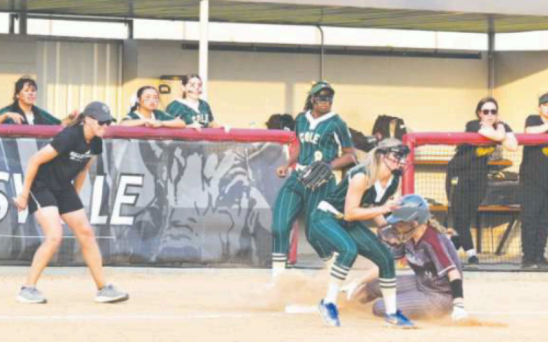 Kaylie Olivarez slides safely into third in the third inning vs. SA Cole. Chuck Grafe/Tribune-Herald