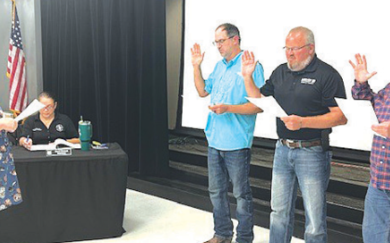 Three board members did the oath of office for the renewal of their term. From left to right is Place 7 Justin Anderle, Place 6 Daniel Beyer, and Place 4 Chuck Greive