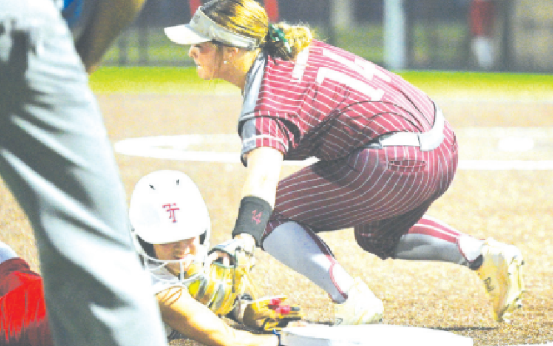 Third baseman Carson Jansky makes a put out at third in the Game 1 win. Chuck Grafe/Tribune-Herald