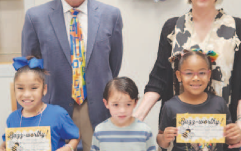 A Spelling Bee Contest was held in April. Students participated in nine rounds of correctly spelling words at the Yoakum Primary campus. Jayla Pinon - 1st place - second grade; Troy Penuelaz - 1st place - 1st grade; Persaias Livingston - 1st place - 2nd grade. Pictured in the back row from left to right are YISD School Board President Glen Kusak and Yoakum Primary School Principal Rebecca Fitch.