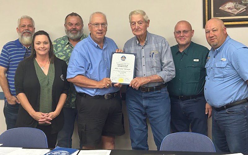 A certificate of appreciation was given to council member Alois “Louis” Herman from City Council for his dedication to the board. Pictured are, left to right, Brady Brown, City Secretary Natalie Fric, Gus Jaehne, Mayor Fred Hilscher, Louis Herman, David Schroeder and Greg Murrile.