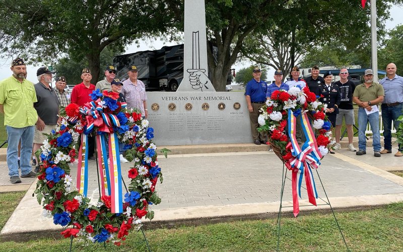 Members of American Legion Post 201 and VFW Post 6209 gather at the Veterans War Memorial after the Memorial Day Ceremony, left to right, John Schroeder Jr., Reggie Guertin, Tony Spann, Ronnie Leck, Harvey Dlouhy, Johnny Loos, David Muehlstein, Jimmy Strait, Ron Renken, Tony Fikac, Rudy Janik, Jeannie Koch, Dennis Muehlstein, John Koch and Jeff Pesek.