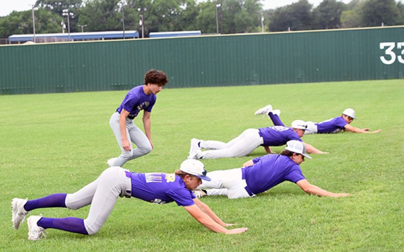 Campers do base-running drills. Photo by Mark Lube.
