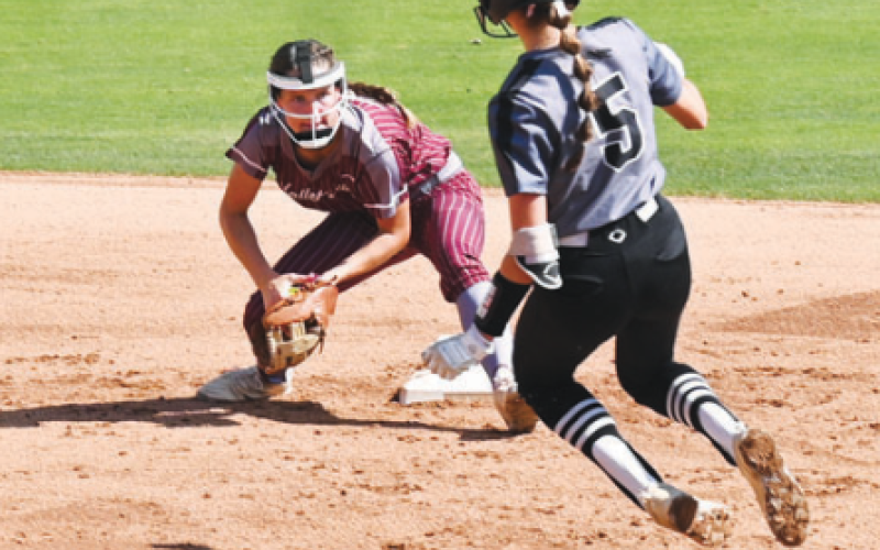 Lady Brahma shortstop Macey Pustka has the ball waiting on an attempted steal in the first inning, Chuck Grafe/Tribune-Herald