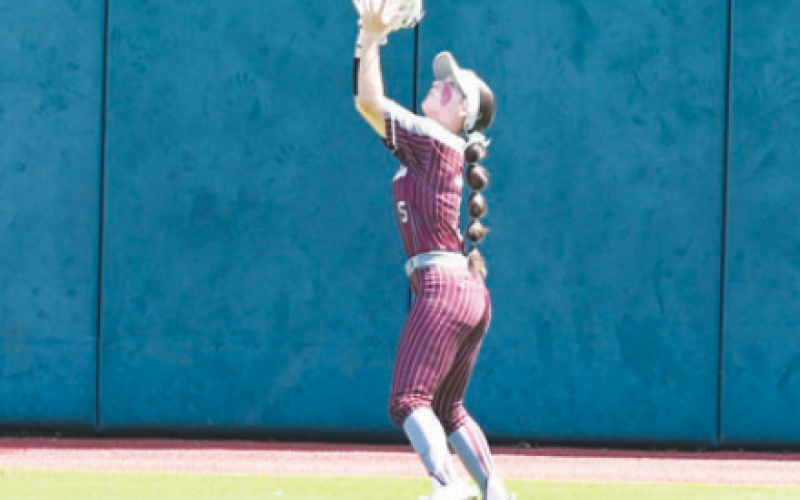 Lady Brahma Hanna Zachary a catches a deep fly ball in the fourth inning. Chuck Grafe/Tribune-Herald