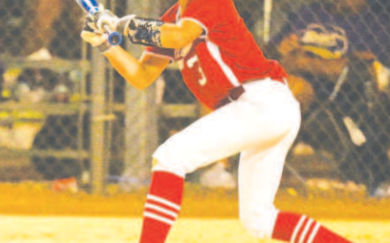 Amryn Etzler put down a sacrifice bunt in the June 18 win over Shiner. Chuck Grafe/Tribune-Herald