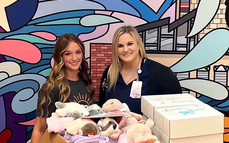 Miss Shiner Callie Sevcik, left, is shown with Brittany (Pohler) Caputo delivering care packages to Dell Children’s Hospital.