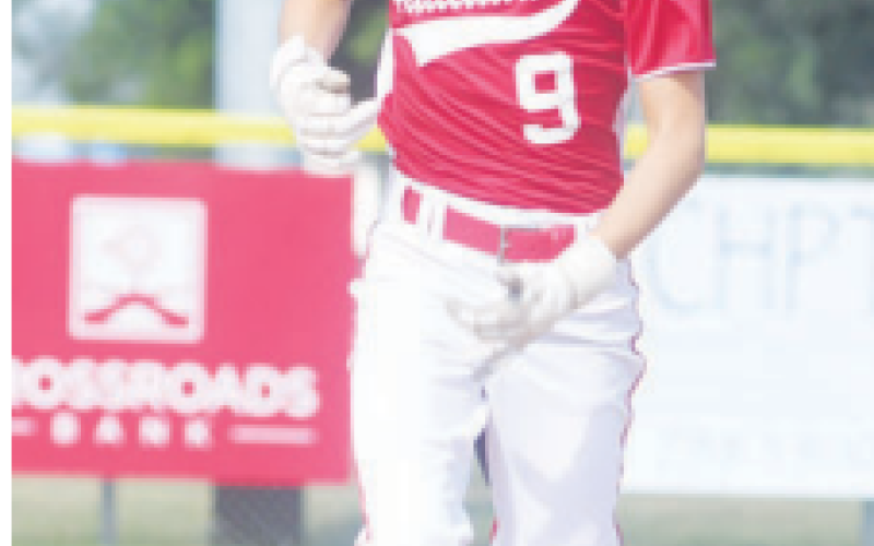 Nash Bucek heads to third before scoring. Chuck Grafe/Tribune-Herald