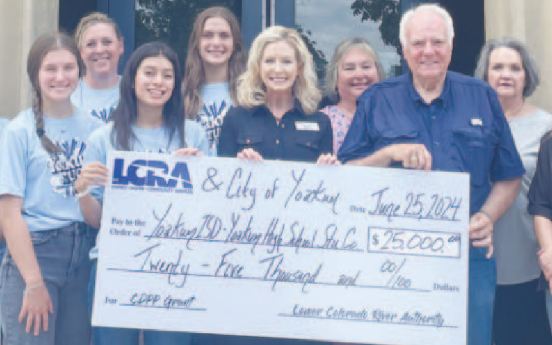 Pictured from left to right are YHS Student Council Secretary Jordyn Eviez, Yoakum Chamber of Commerce Board Chair Alexa Fikac, Illana Garcia, YHS Student Council Vice President, YHS Student Council Communications and Social Media Officer Leah Muenich, YHS Student Council Advisor Amy Robbins, YHS Student Council President Abbie Galvan, YHS Student Council Treasurer Samantha Adamek, LCRA Board Member Margaret D. “Meg” Voelter, City of Yoakum Mayor Pro Tem Tanya Wenzel, City of Yoakum Mayor Carl O’Neill..