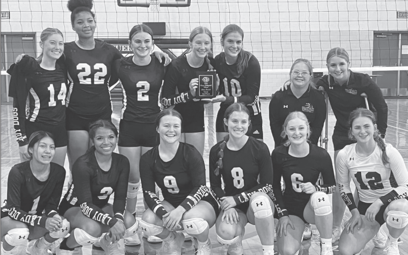 Pictured are the Lady Bulldogs of the Yoakum High School Volleyball Team with their first place plaque in the Aug.15-17 tournament. Contributed photo