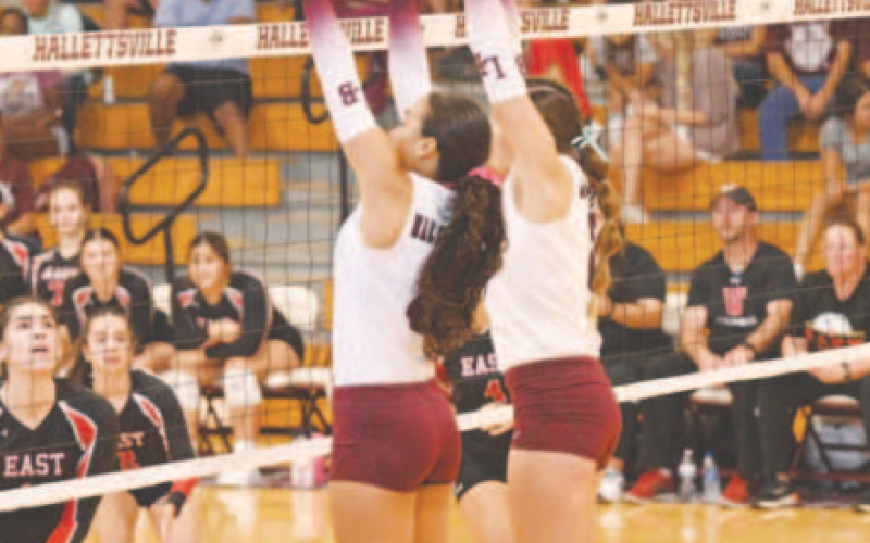 Kasey Harper, left and Christine Felcman defend during Hallettsville’s loss to Victoria East here Tuesday, Aug. 20. Chuck Grafe/Tribune-Herald