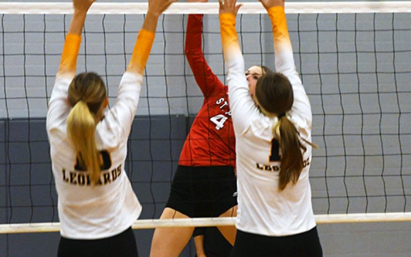 Skylar Mozisek in action for St. Paul against Van Vleck.  Photo by Mark Lube.