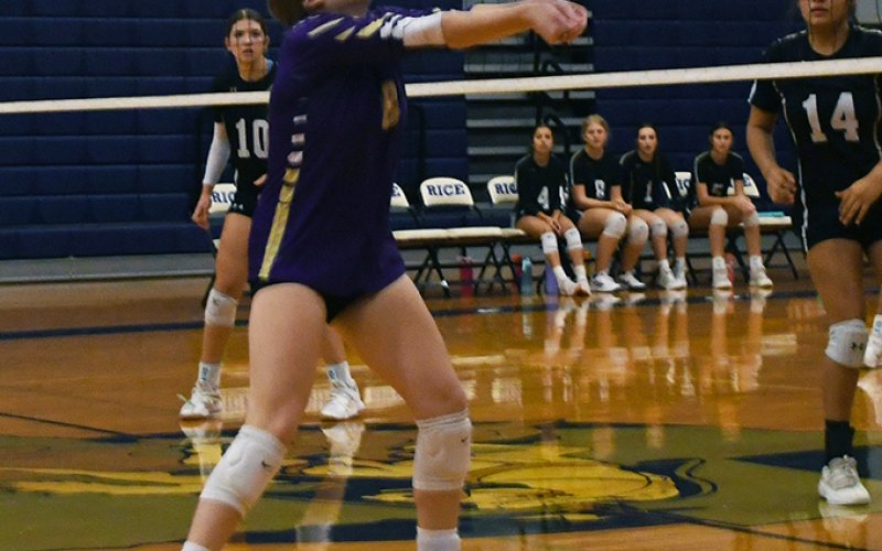 Paisly Wallace with one of her six digs against Giddings in the Rice Tournament. Photo by Mark Lube.