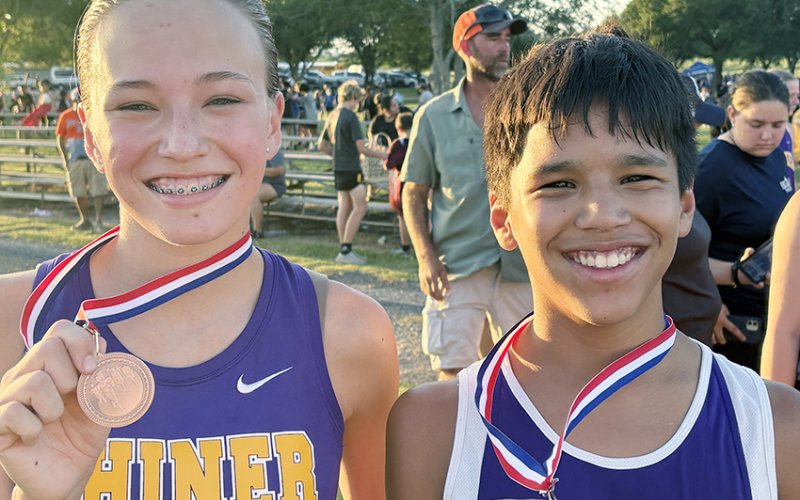 Shiner JH medal winners at Schulenburg CC meet last Thursday. From left are Alena Winkenwerder and Josh Lecon. Photo courtesy of Michelle Winkenwerder.