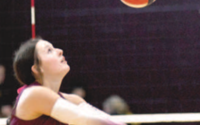 Hanna Zachary volleys in the win over Yorktown. Chuck Grafe/Tribune-Herald