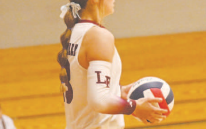 Addison Matula prepares to serve in the Edna loss here Tuesday, Sept. 17. Chuck Grafe/Tribune-Herald