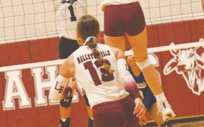 Jans Henke (7) on the attack during the loss to Edna here Tuesday, Sept. 17. Chuck Grafe/Tribune-Herald