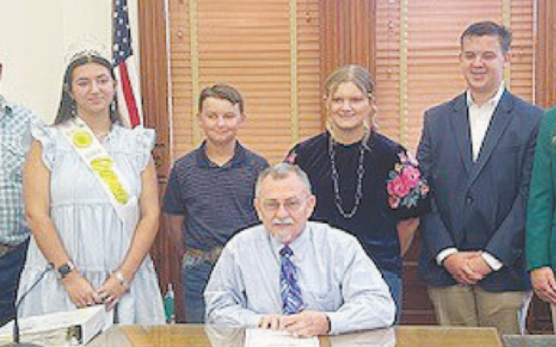 The DeWitt County Commissioners declared the week starting Oct. 6 as National 4-H Week. Pictured from left to right are Commissioners James Kaiser, James Pilchiek Sr., 4-H County Councilmembers Kassidy Cowey, Carter Roeder, Judge Daryl Fowler, 4-H County Councilmembers Kaitlyn Roeder, Gunnar Frank, and Ella Jander, and DeWitt County Commissioners Brian Carson and Ryan Varela. Photo by Clayton Kelley.