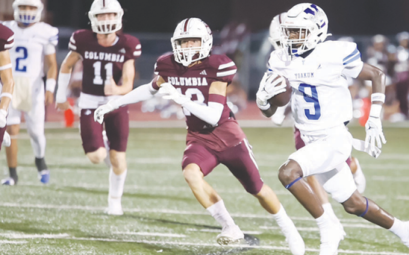 Kennan Dilworth (9) attempts to race past Roughneck players. Photo courtesy of Raymond Rosas.