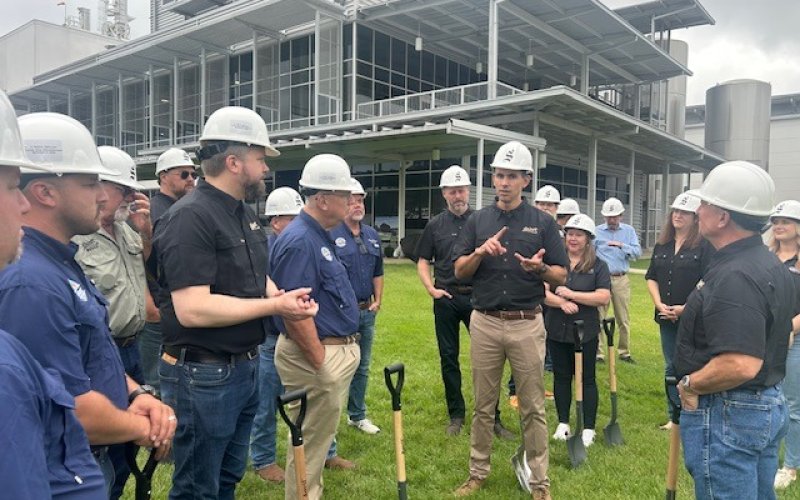Director of Brewery and Distillery Operations Tom Fiorenzi and President and CEO John Brozovich speak to city officials about the new lounge and bar coming to Spoetzl Brewery.