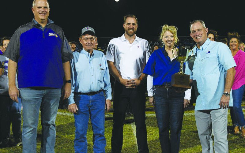 Pictured are, left to right, Shiner ISD Superintendent Alex Remschel, David Wagner (Texas Farm Bureau), Karl Ellis (Texas Farm Bureau), Janella Matias (Texas Farm Bureau) and Ray Zepeda (UIL Athletic Director). Photo by Mark Lube.