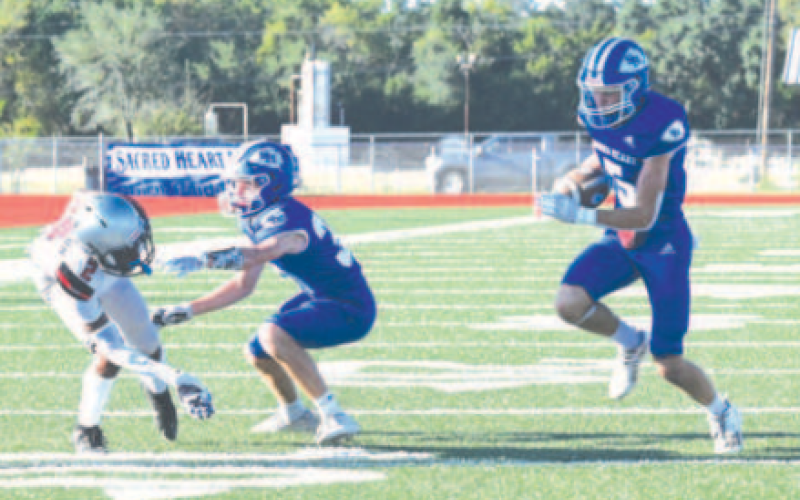 Halfback Riley Haas scored on this 12-yard run in the first quarter. Chuck Grafe/Tribune-Herald