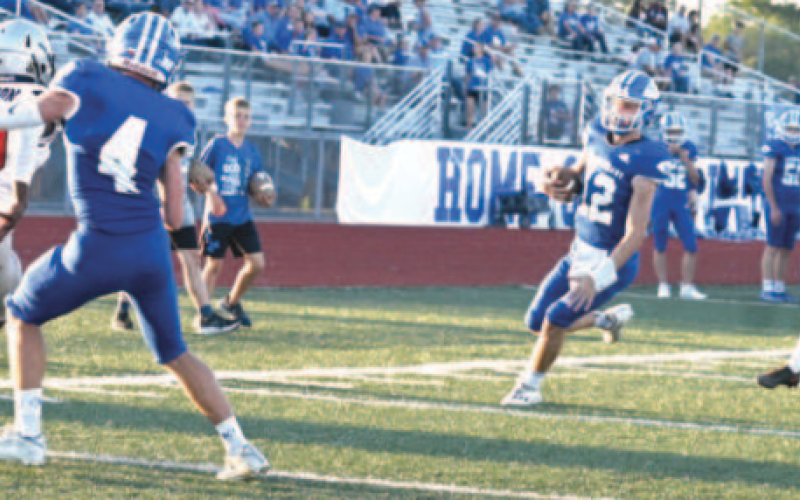 Quarterback Andrew Steffek scrambled for an 8-yard touchdown run in the third quarter. Chuck Grafe/Tribune-Herald