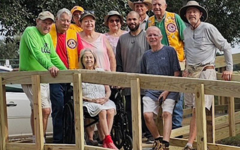 Hallettsville Lions Club members Charlie Neuymeyer, Annabeth Neumeyer, Shirley Rothbauer, David Smolik, Ron Richards, and Michael Moore as well as volunteers Santiago Cazaras and Texas Ramp Leaders Darryl O’Bryant, Mark Kortokrax, and Dick Nance finish up building a ramp for the Texas Ramp Project. Photo courtesy of Michael Moore.