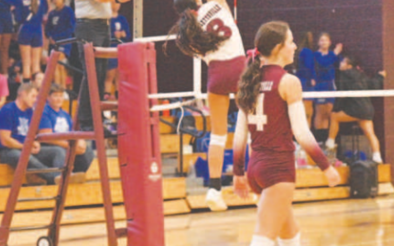 Kasey Harper on the attack in the third set vs. Yoakum here Friday. Chuck Grafe/ Tribune-Herald