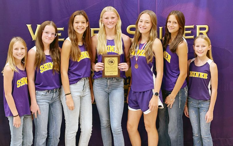 The Shiner JH girls cross country team won the district title. Photo courtesy of Michelle Winkenwerder.