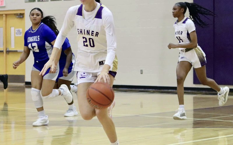 Morgan Lenehan dribbles down court in the Lady Comanches win over Edna on Saturday. She led all scorers with 22 points. Photo courtesy of Louann Heinsohn.