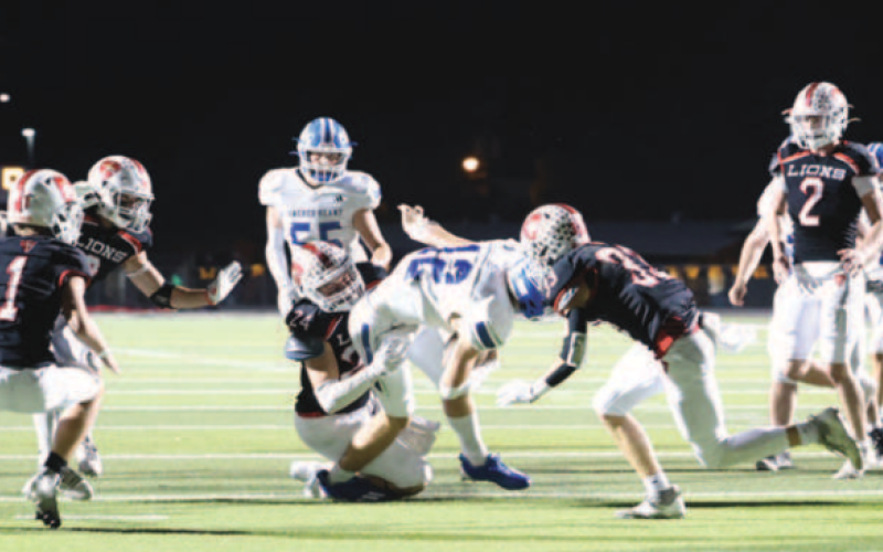 Indian quarterback Andrew Steffek (12) falls short of the goal line in the second quarter. Chuck Grafe/Tribune-Herald