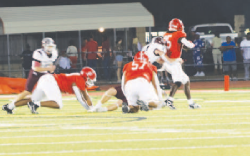 Linebacker Colt Edmonds tackles Bryan Salazar. Chuck Grafe/Tribune-Herald