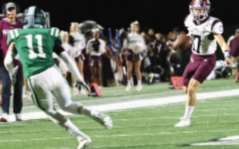 Wyatt Kram (17) took over at quarterback in the second quarter after an injury to Mycole Pegoda and rushed for 25 yards and passed for 98 yards. Chuck Grafe/Tribune-Herald