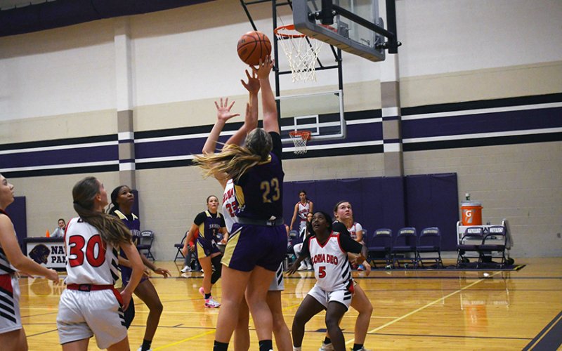 Kailey Boedeker takes a shot in the first half against Gloria Dea Academy on Thursday. She had 13 points in the game. Photo by Mark Lube.