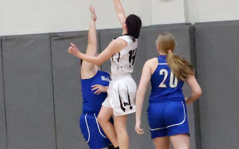 Addison Simper goes up for shot in Friday’s game against Sacred Heart. Simper scored 10 points in the game. Photo courtesy of Chuck Grafe/Hallettsville Tribune-Herald.
