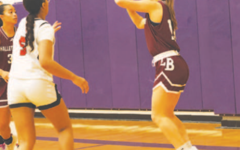 Addison Matula vs. Victoria West. Chuck Grafe/Tribune-Herald